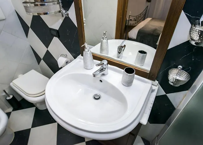 בית הארחה Vicolo Dell'aquila - Residenze Romanae 4*